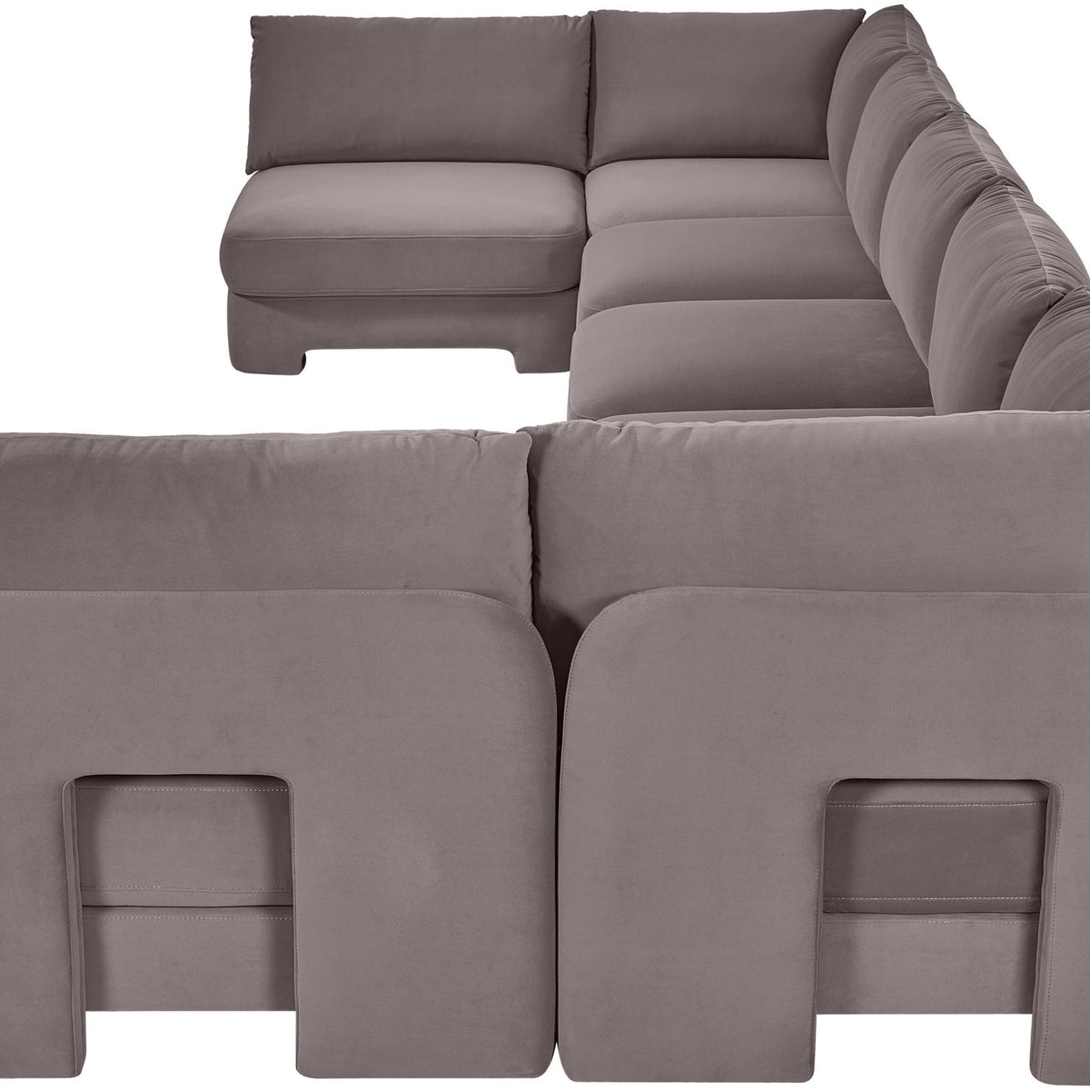 Medium gray velvet performance fabric U-shaped armless sectional with thick back pillows.