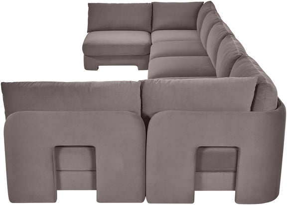 Medium gray velvet performance fabric U-shaped armless sectional with thick back pillows.