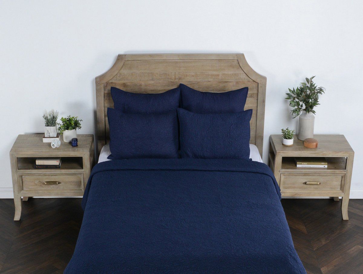 Indigo king sham set on bed with two matching pillow shams