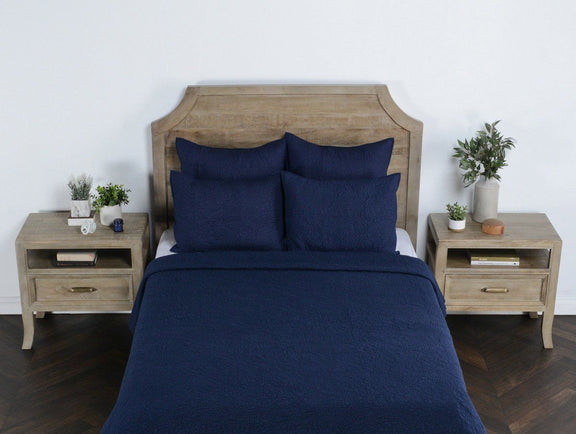 Indigo king sham set on bed with two matching pillow shams