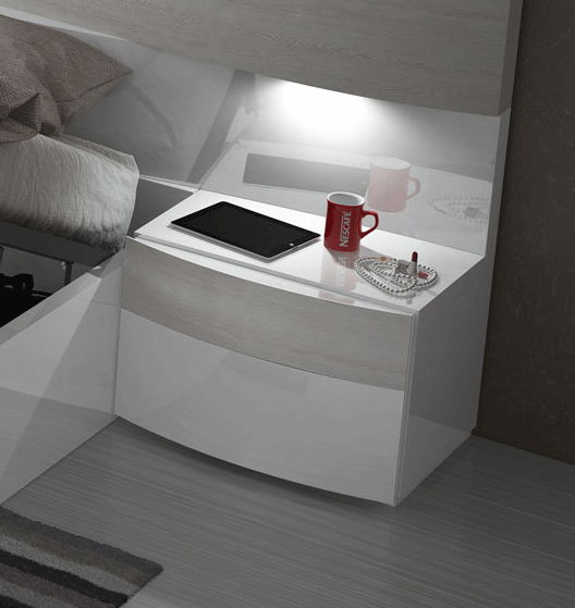 White corner nightstand with open shelf and two drawer fronts.