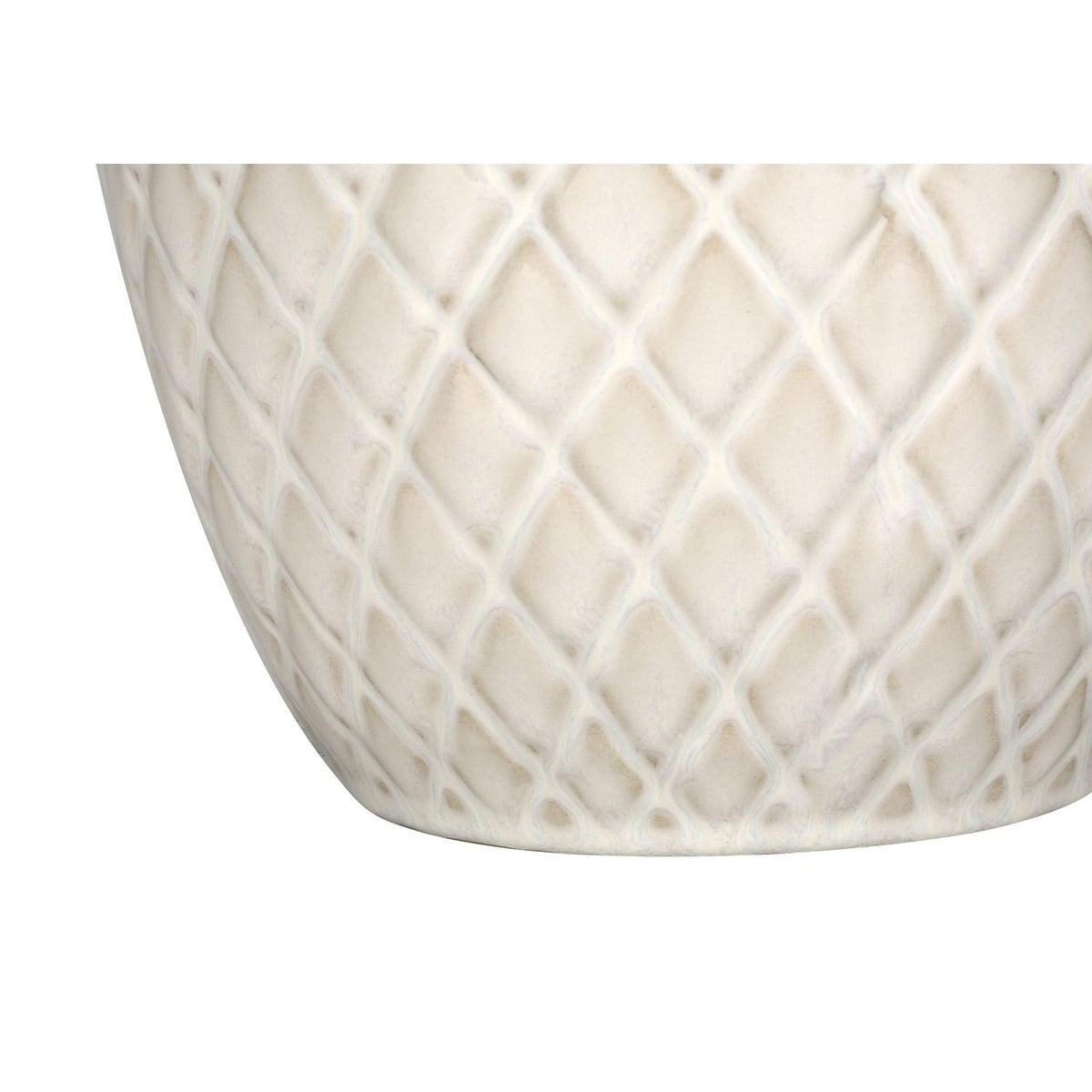 Close-up of cream textured ceramic lamp base with diamond lattice pattern