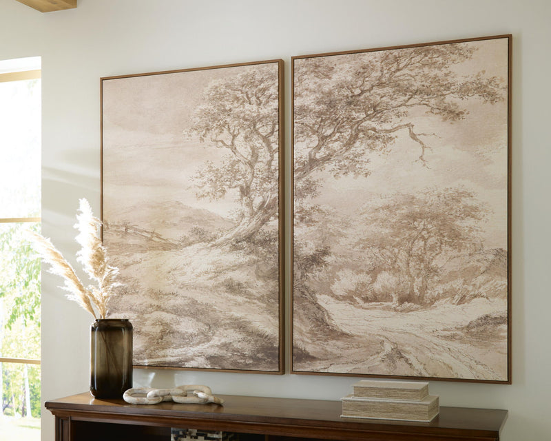 Two framed beige and brown landscape prints featuring detailed tree branches