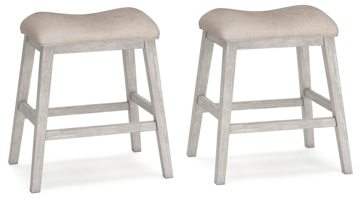 Set of 2 upholstered stools with light beige seats and weathered gray frames