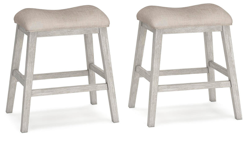 Set of 2 upholstered stools with light beige seats and weathered gray frames