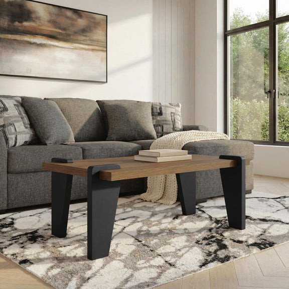 Rectangular wood coffee table with black legs and corner pads