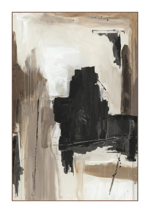 Framed abstract wall art with black and white paint marks on a light, neutral background
