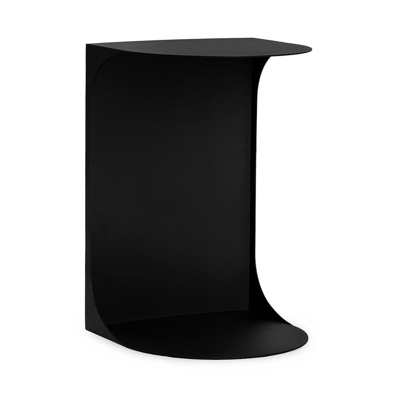 Black metal accent table with curved cutout shelf and round top, angled view.