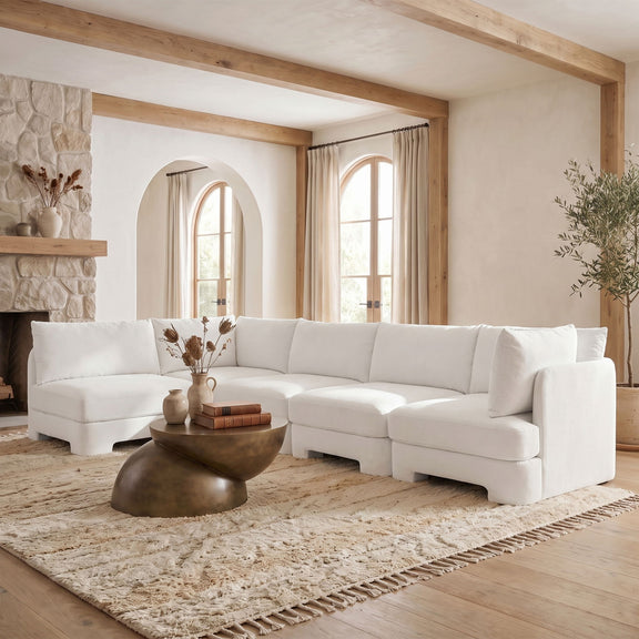 White velvet sectional sofa with chaise corner and wide back cushions