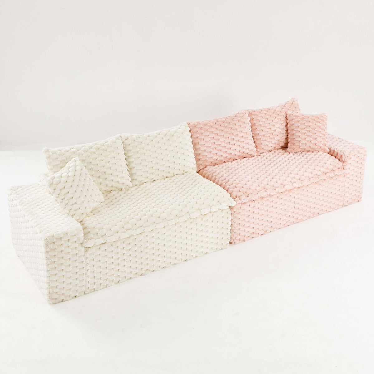Two-piece multifunctional sofa in cream and light pink, textured fabric with matching cushions