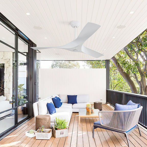 White 4-blade ceiling fan on covered patio ceiling