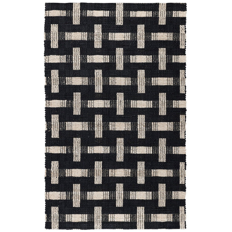 Preston rug with dark geometric lattice in black, white, and ivory