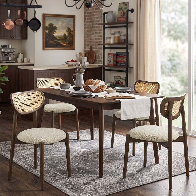 Rattan dining chairs with cream seats around a dining table