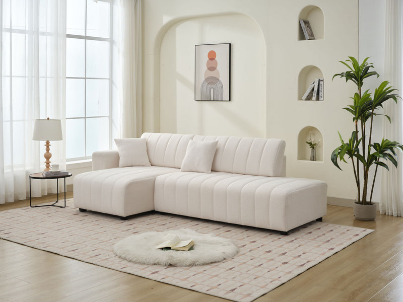 Beige lamb wool sectional sofa with chaise, left-facing configuration