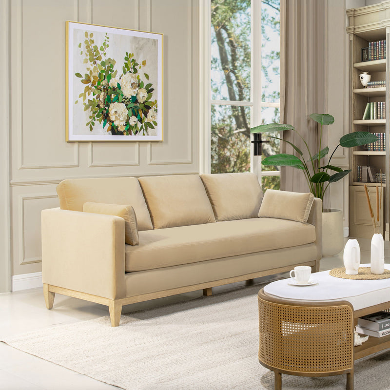 Modern farmhouse sofa in light beige fabric with rolled arms and three-seat cushions