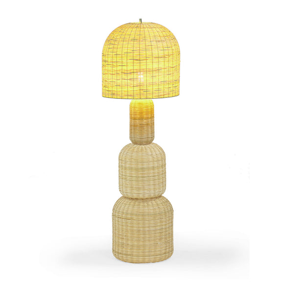 Natural rattan floor lamp with warm-toned woven dome shade and cylindrical column