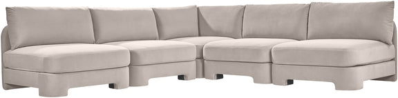 Light gray armless velvet sectional sofa with modular corner units and low profile.