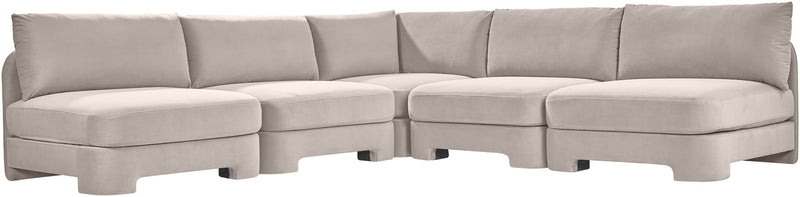 Light gray armless velvet sectional sofa with modular corner units and low profile.