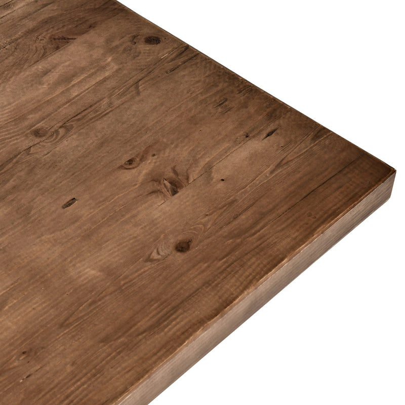 Close-up of brown wooden counter table top with visible grain and knots