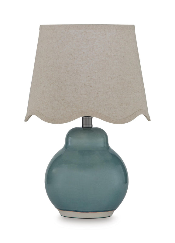 Blue ceramic table lamp with beige fabric shade