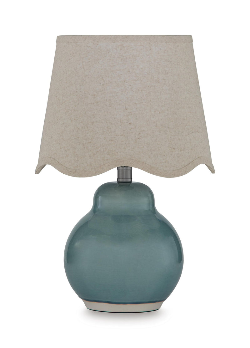 Blue ceramic table lamp with beige fabric shade