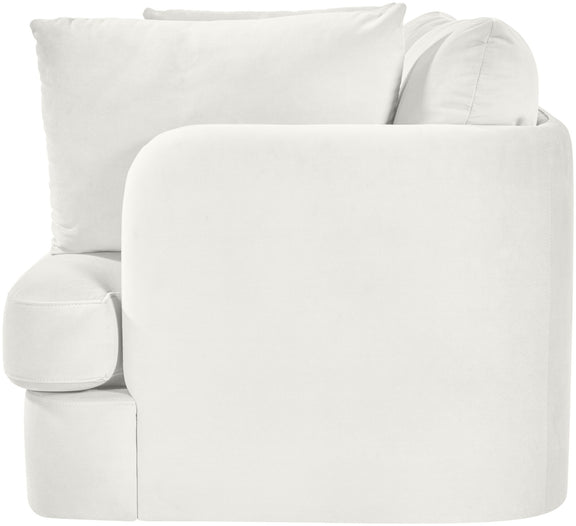White velvet upholstered loveseat with rounded arms and two back cushions