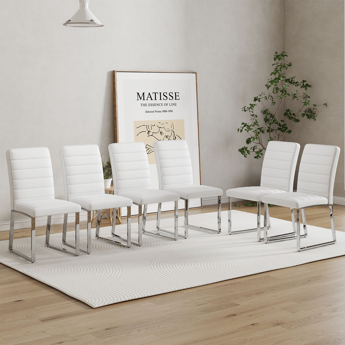 Multiple white upholstered dining chairs with curved backs and chrome legs in a row