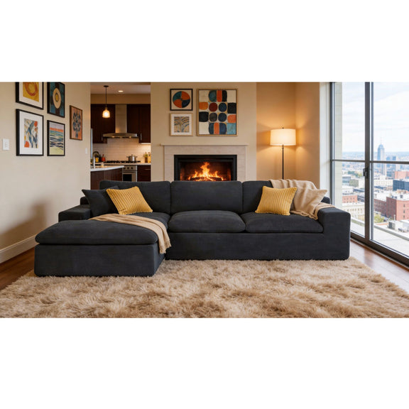 Black U-shaped sectional sofa with chaise, yellow pillows, and beige throw blanket