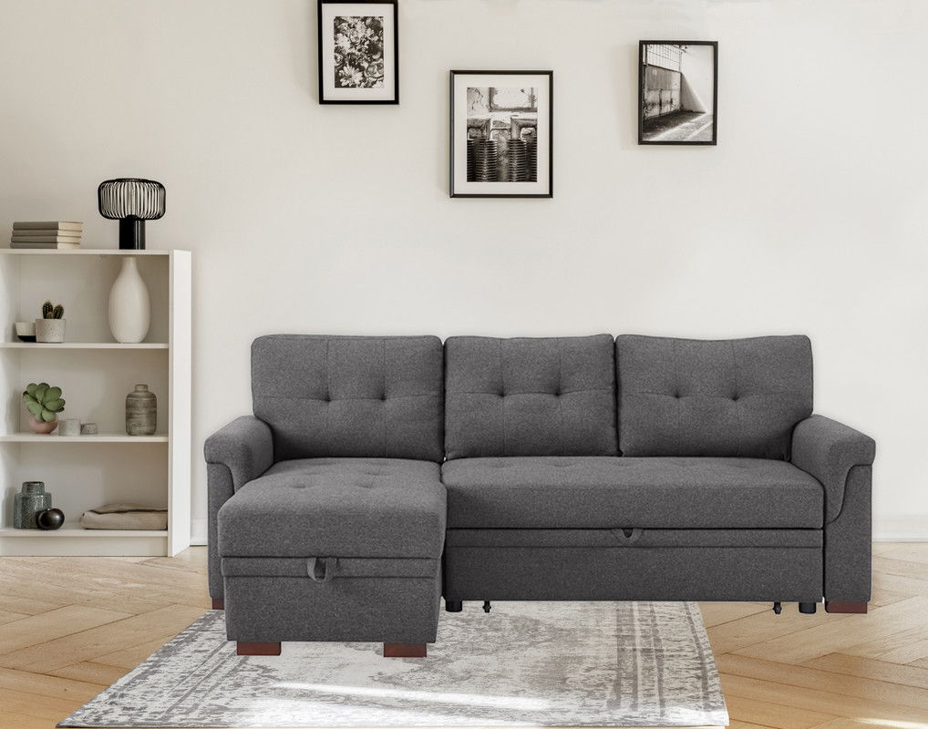 Dark gray reversible sleeper sectional sofa with storage chaise, tufted back
