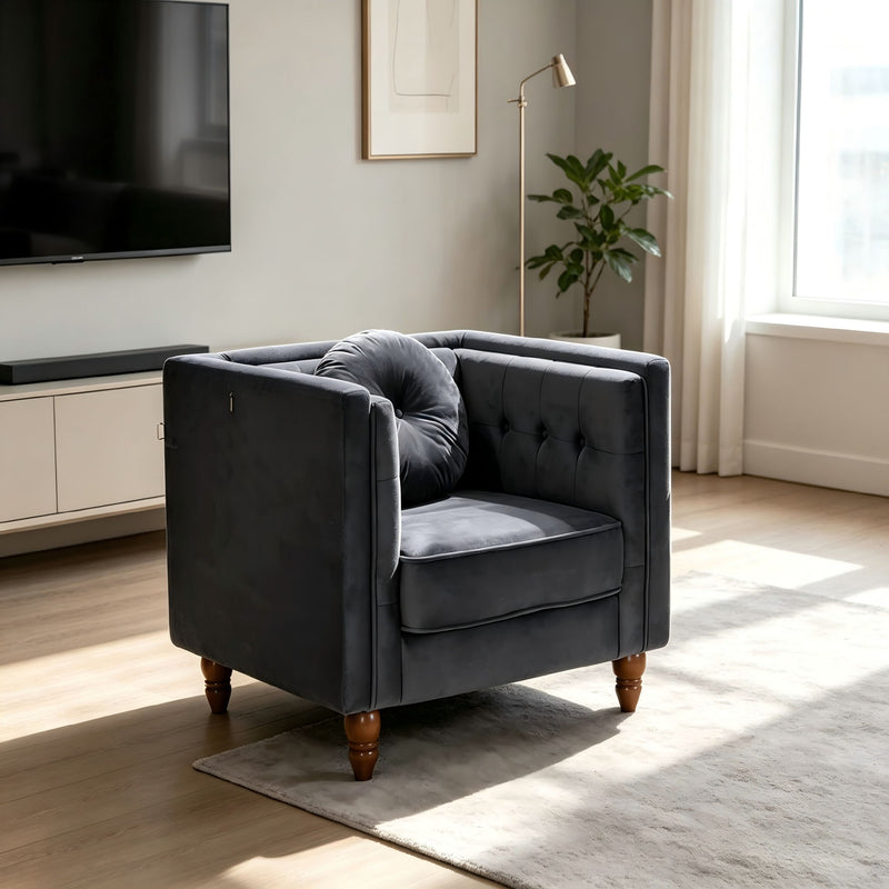 Dark gray tufted accent side chair with square arms and upholstered seat