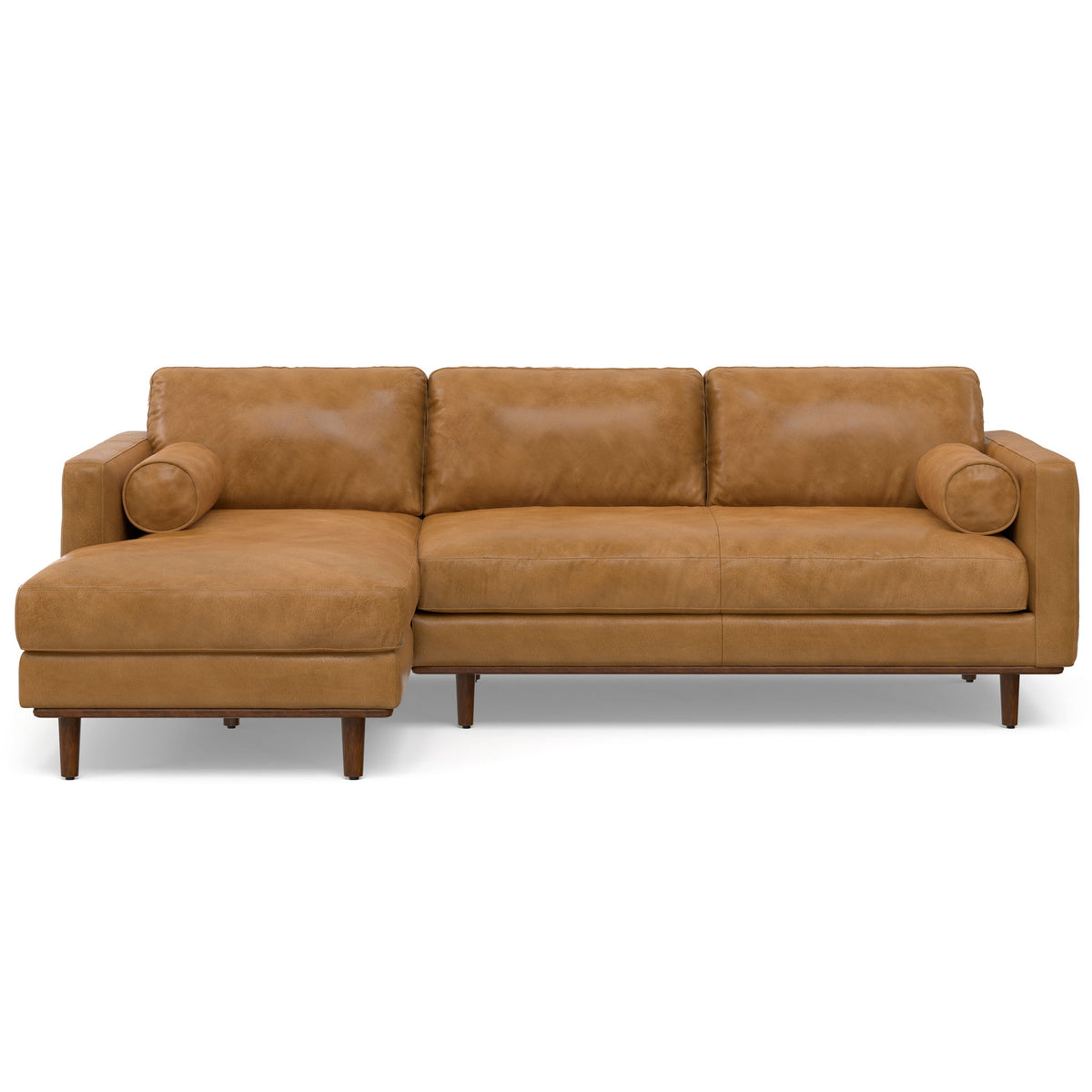 Light brown upholstered sectional sofa with rounded arms, back cushions, and right chaise