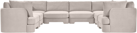 Light gray velvet performance sectional with deep seats, rounded arms, and U-shaped layout