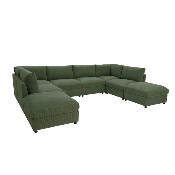 Green sectional sofa with ottoman chaise corners and padded back cushions