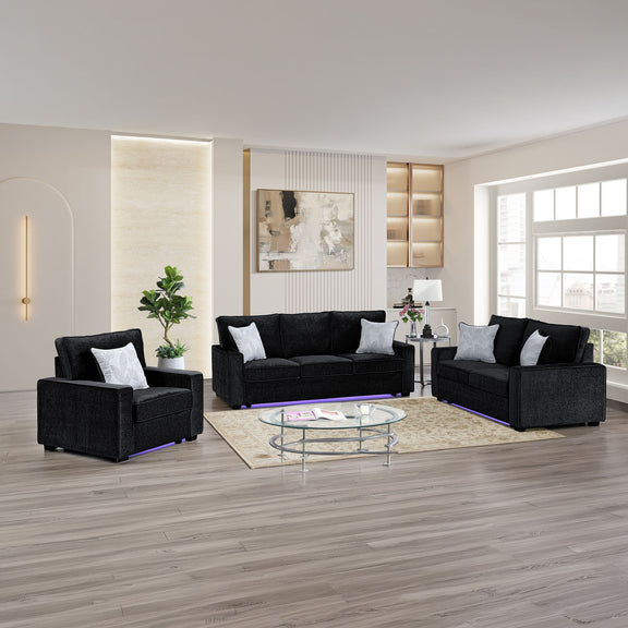 Dark gray living room seating set with sofa, loveseat, and armchair; LED base light
