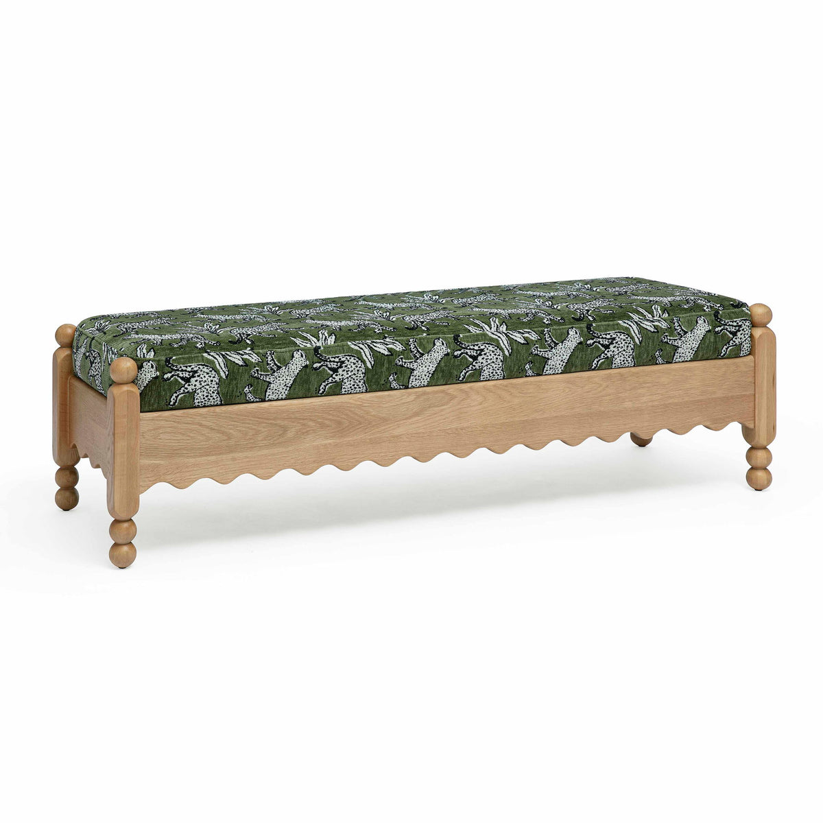 Green leopard jacquard upholstered bench with scalloped skirt and wooden side rails