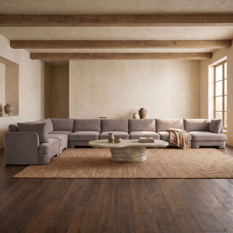 Gray-brown L-shaped velvet sectional sofa with chaise lounge and tufted seat cushions