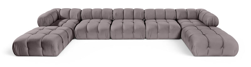 Gray modular sectional sofa with tufted seat panels and rounded armrests, sectional layout