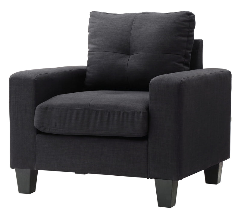 Dark gray upholstered accent chair with high back, padded arms, and thick seat cushion