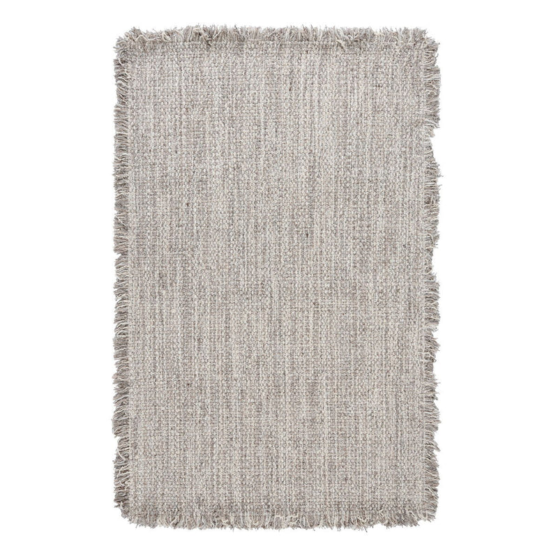 Light beige wool rug with short fringe and fine textured pile.