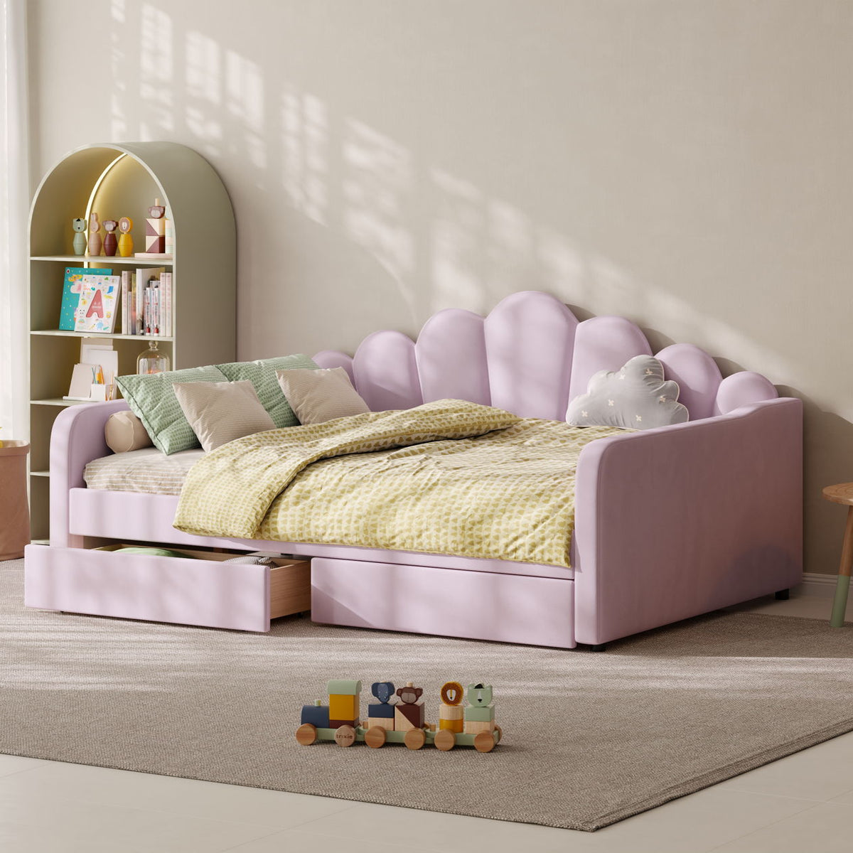 Pink upholstered daybed frame with shell-style headboard and cushioned side panels