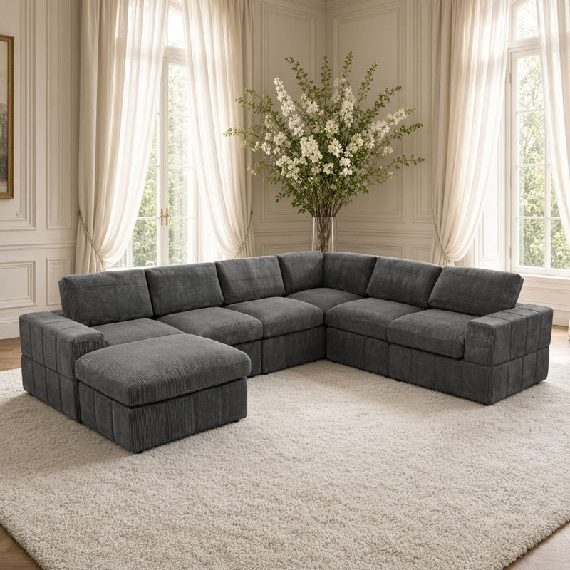 Dark gray sectional sofa with corner chaise and two matching ottomans, L-shape