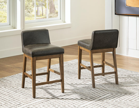 Two-tone brown upholstered barstool pair with dark seats on light wood legs