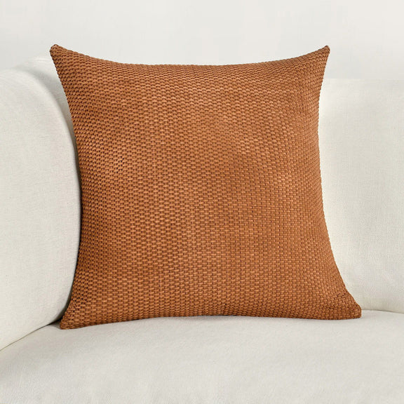 Square woven bassinet pillow in hazel, front view with visible stitching seams