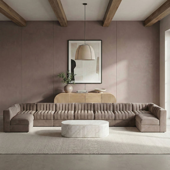 Dark gray armless velvet modular sectional with tufted back cushions and low ottoman-style seats