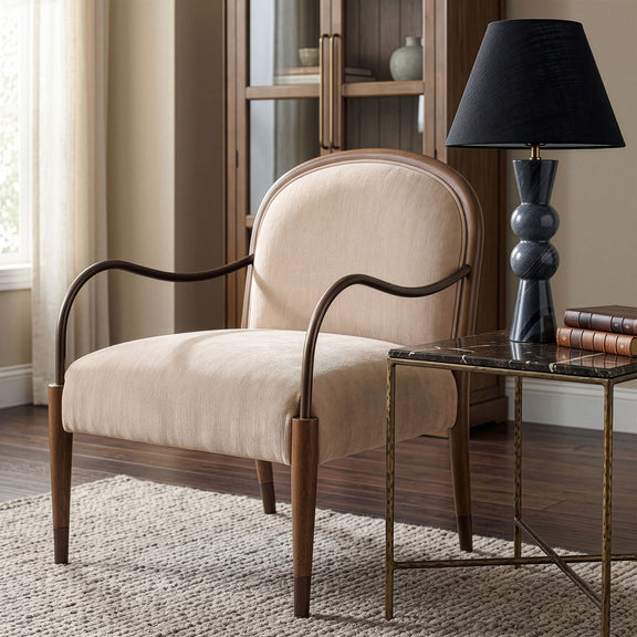Beige fabric upholstered accent chair with curved armrests and arched back