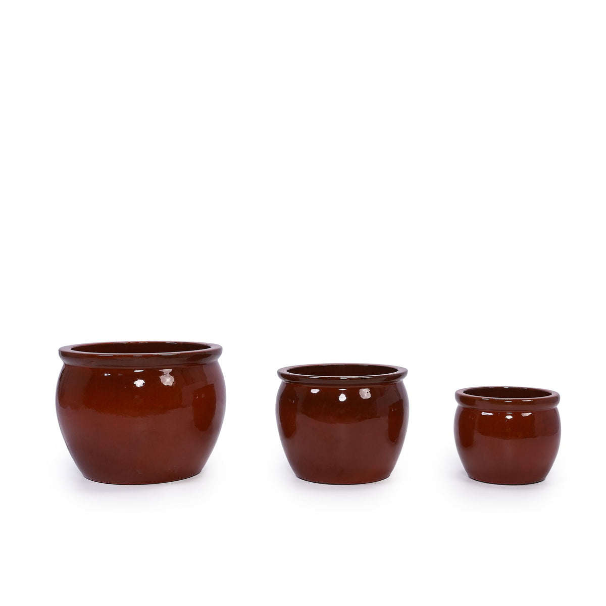 Set of 3 glossy red ceramic flowerpots, rounded bowls with wide rims