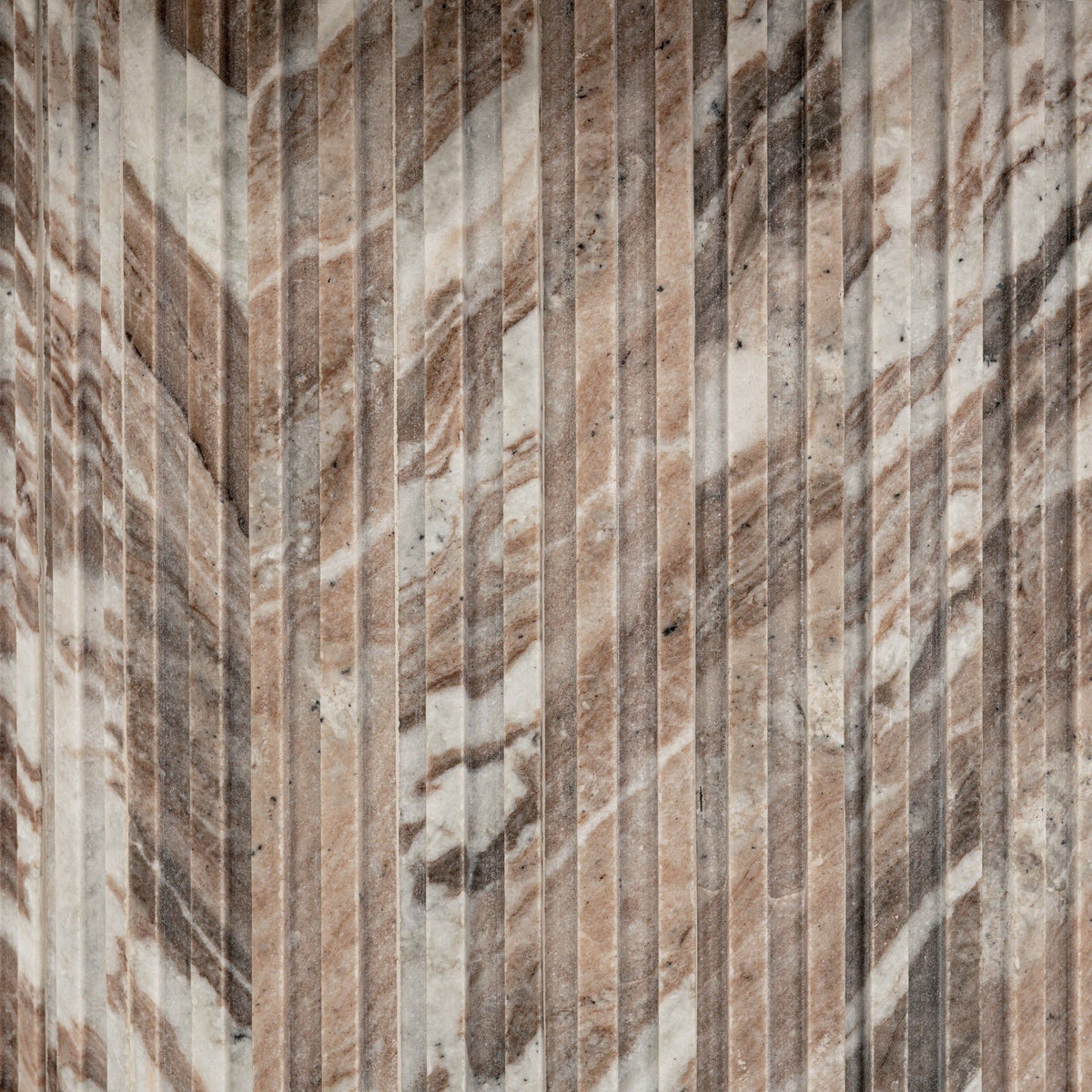 Close-up of cylindrical marble base with vertical texture and warm gray streaks