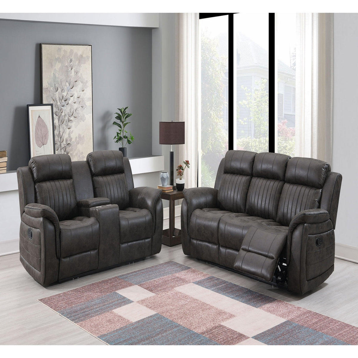 Dark gray reclining sofa with padded arms and recline back; two-piece set