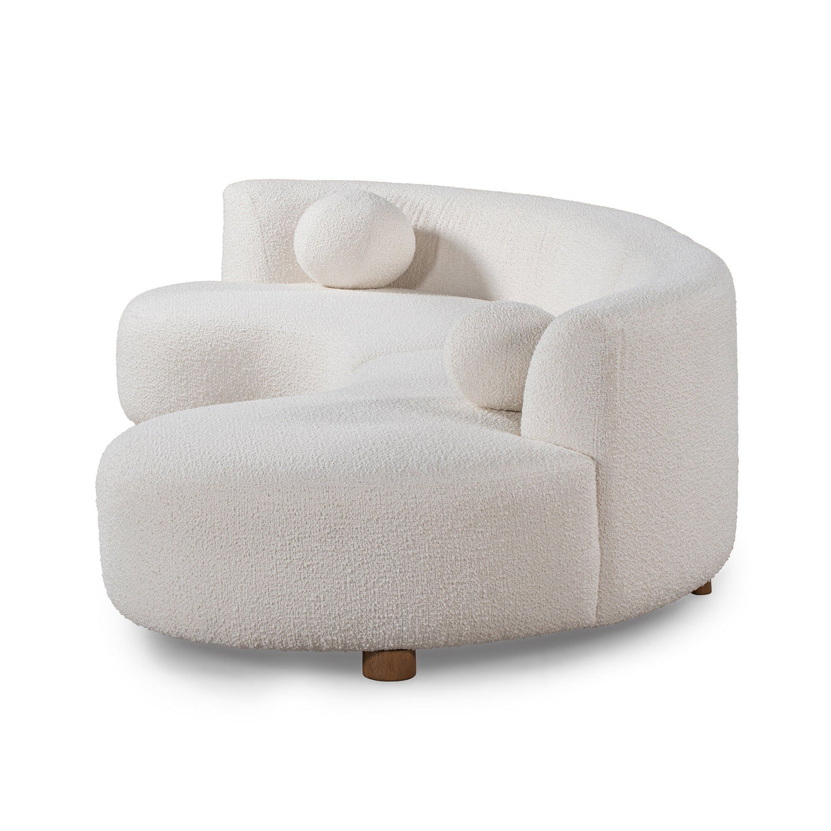 Ivory sectional lounge chair with rolled arms and two circular pillows