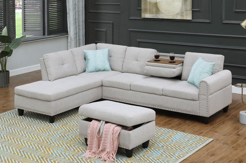 Light gray sectional sofa with left-facing chaise and matching ottoman, blue accent pillows